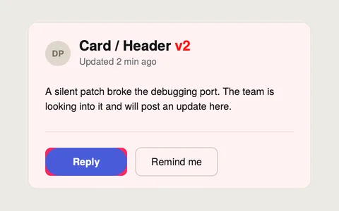 The card with the changed pixels painted red: the v2 suffix and the button's edges.